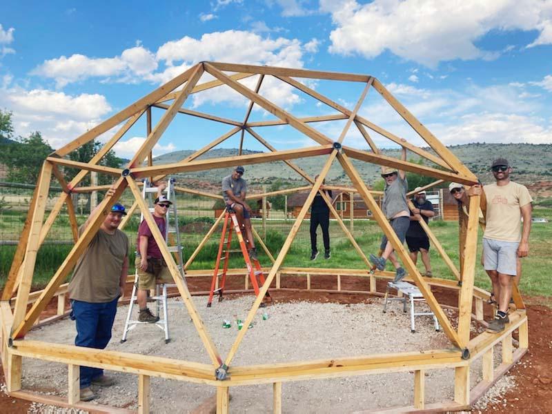 Students showcase their geodesic dome greenhouse on the ASI campus